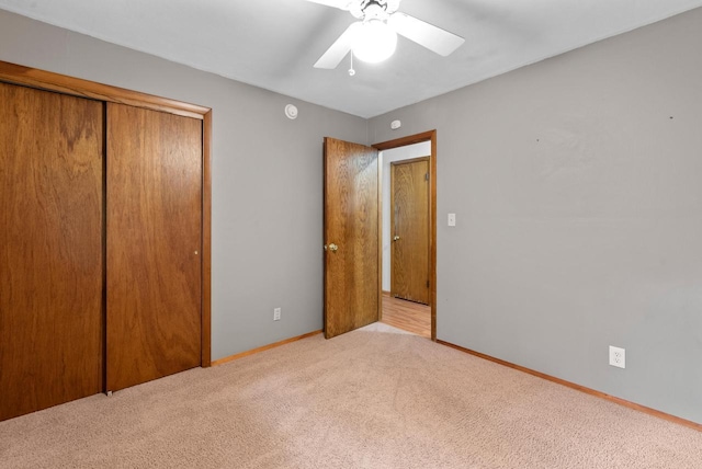W188N10115 Maple Rd, Germantown, WI 53022 - unfurnished bedroom with a closet, carpet floors, and ceiling fan