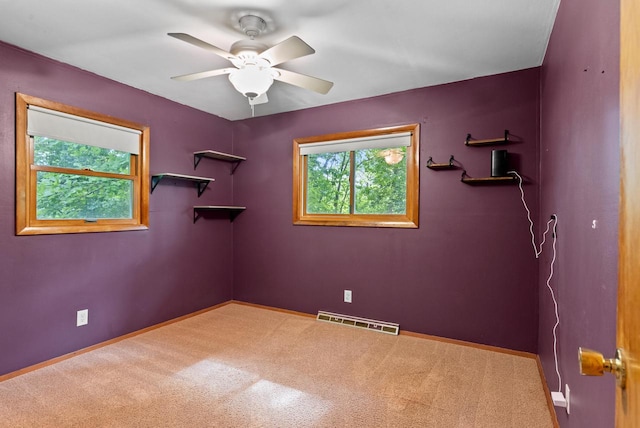 W188N10115 Maple Rd, Germantown, WI 53022 - carpeted spare room featuring ceiling fan and baseboards