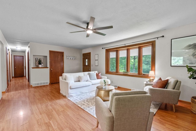 W188N10115 Maple Rd, Germantown, WI 53022 - living area with a ceiling fan and light wood-style floors