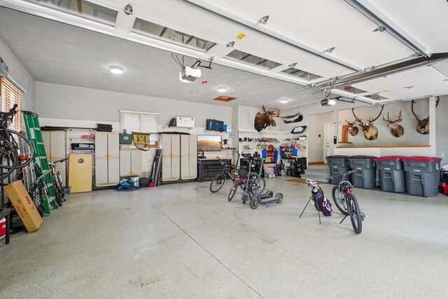 5570 Surrey Ln, Waunakee, WI 53597 - garage with a garage door opener