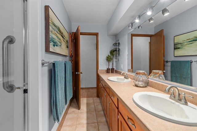 1001 S Matthias St, Appleton, WI 54915 - full bathroom featuring double vanity and tile patterned flooring