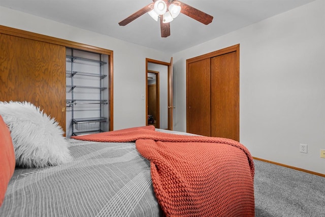 1001 S Matthias St, Appleton, WI 54915 - bedroom with carpet flooring, baseboards, two closets, and a ceiling fan