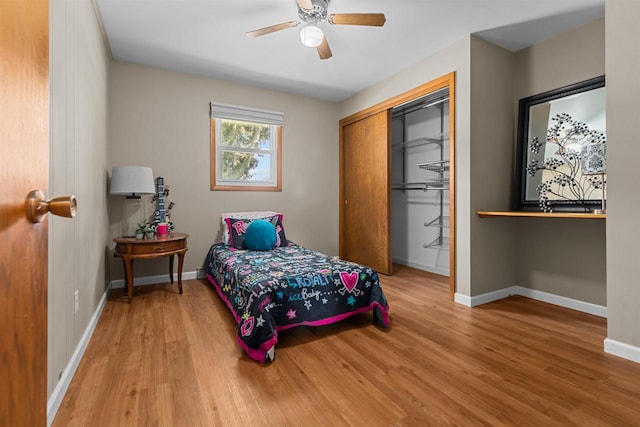 1001 S Matthias St, Appleton, WI 54915 - bedroom with wood finished floors, a closet, baseboards, and a ceiling fan