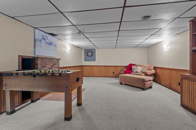 1001 S Matthias St, Appleton, WI 54915 - recreation room with a drop ceiling, a wainscoted wall, carpet, and wood walls