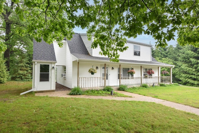 4900 S 67th St, Greenfield, WI 53220 - view of front of home featuring covered porch, a front lawn, and roof with shingles