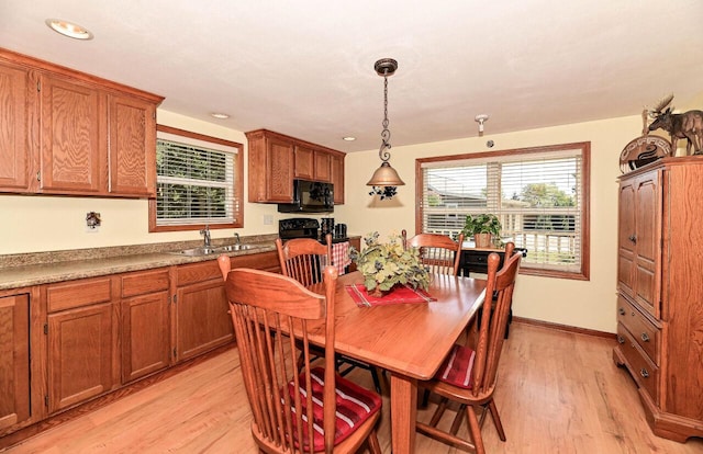 4900 S 67th St, Greenfield, WI 53220 - dining room with light wood-style floors, plenty of natural light, and recessed lighting