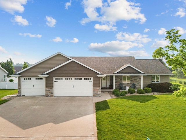W6708 Prescott Dr, Greenville, WI 54942 - view of front of house featuring stone siding, driveway, a garage, and a shingled roof