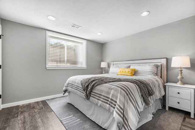 W6708 Prescott Dr, Greenville, WI 54942 - bedroom with dark wood-style flooring, baseboards, and recessed lighting