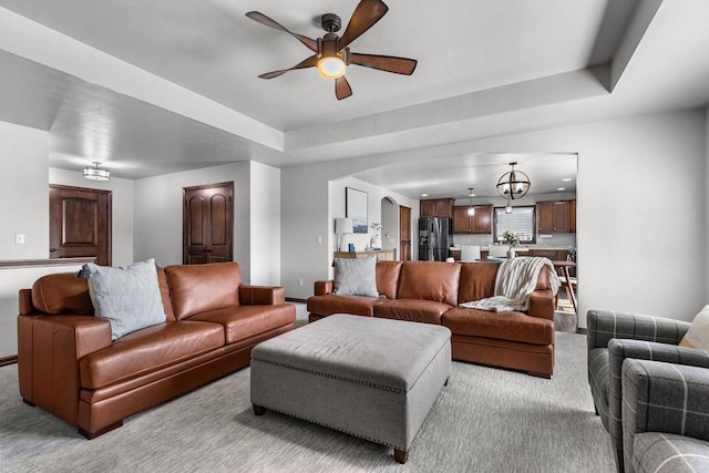 W6708 Prescott Dr, Greenville, WI 54942 - carpeted living area with a ceiling fan, baseboards, and a raised ceiling