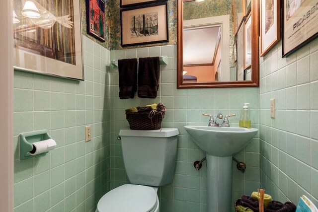 1705 Emerson St, Beloit, WI 53511 - half bath with tile walls and toilet
