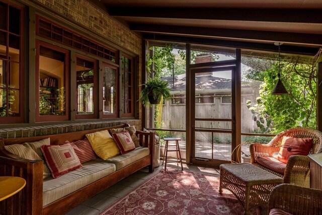 1705 Emerson St, Beloit, WI 53511 - sunroom with plenty of natural light and beam ceiling