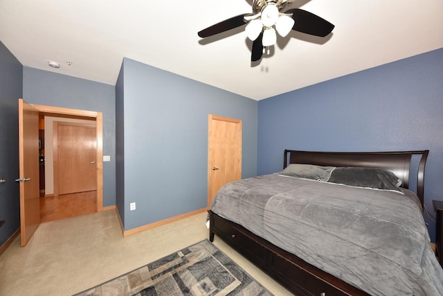 601 E Ogden Ave Unit 411, Milwaukee, WI 53202 - bedroom featuring carpet flooring, baseboards, and a ceiling fan