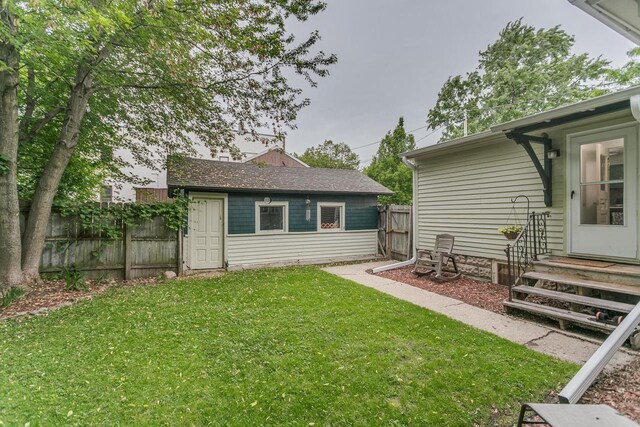543 N Durkee St, Appleton, WI 54911 - view of yard featuring an outbuilding and entry steps