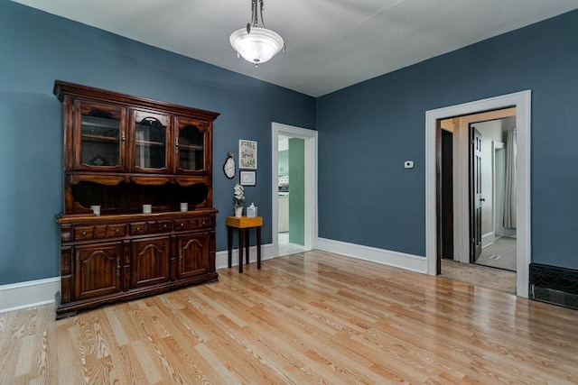 543 N Durkee St, Appleton, WI 54911 - empty room featuring wood finished floors and baseboards