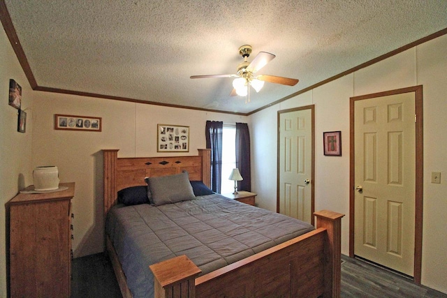 302 Lakeshore Dr, Avoca, WI 53506 - bedroom featuring ornamental molding, lofted ceiling, a textured ceiling, dark wood-style floors, and a ceiling fan