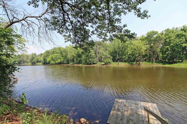 302 Lakeshore Dr, Avoca, WI 53506 - water view featuring a dock and a heavily wooded area