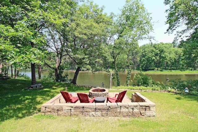 302 Lakeshore Dr, Avoca, WI 53506 - view of grassy yard featuring an outdoor fire pit and a water view