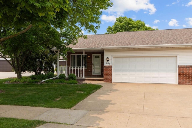 302 Parkside Ct, Kimberly, WI 54136 - single story home featuring brick siding, concrete driveway, a porch, a garage, and a front yard