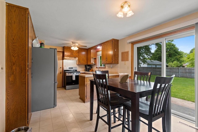 57 Solar Cir, Appleton, WI 54915 - dining space featuring ceiling fan and light flooring