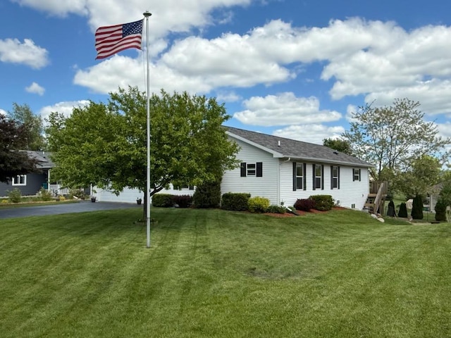 S5472 Mammoth Trl, Baraboo, WI 53913 - view of front facade with a front yard