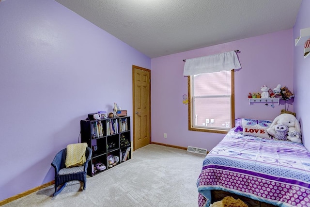 S5472 Mammoth Trl, Baraboo, WI 53913 - bedroom featuring carpet flooring, baseboards, and a textured ceiling