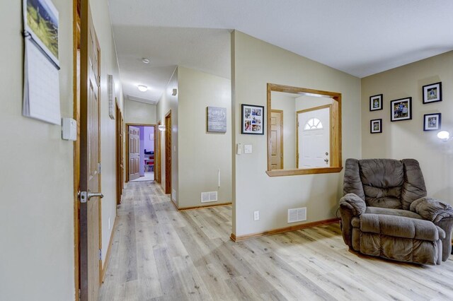 S5472 Mammoth Trl, Baraboo, WI 53913 - corridor featuring light wood-type flooring and baseboards