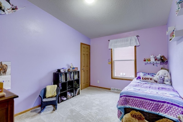 S5472 Mammoth Trl, Baraboo, WI 53913 - carpeted bedroom featuring vaulted ceiling, a textured ceiling, and baseboards