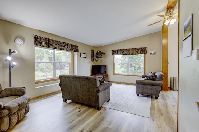 S5472 Mammoth Trl, Baraboo, WI 53913 - living area featuring light wood-type flooring, baseboards, a ceiling fan, and lofted ceiling