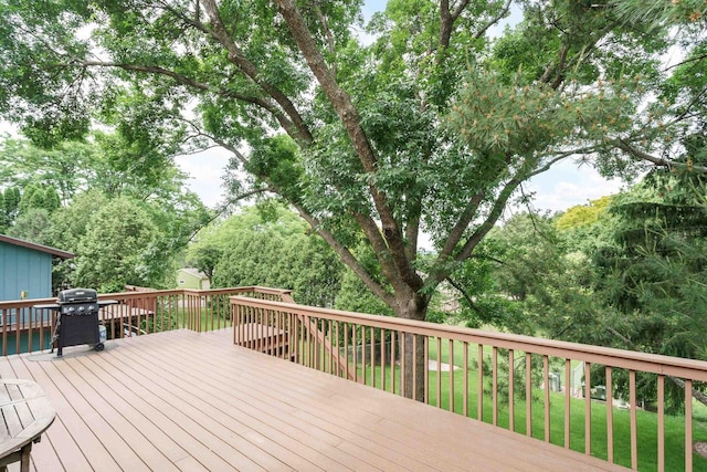 2806 Maple Grove Dr, Madison, WI 53719 - wooden terrace featuring a yard, a grill, and view of scattered trees