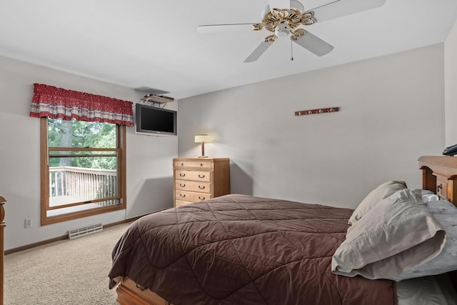 2806 Maple Grove Dr, Madison, WI 53719 - carpeted bedroom with baseboards and ceiling fan