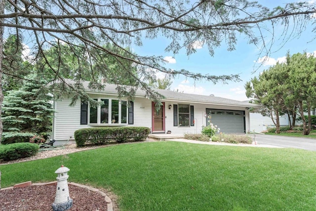 2806 Maple Grove Dr, Madison, WI 53719 - ranch-style home with driveway, a garage, and a front yard