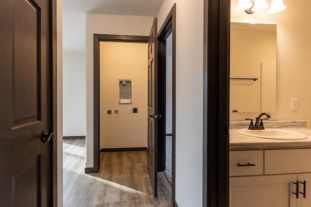 910-920 Green Pastures Trl, Plover, WI 54467 - bathroom with wood finished floors and vanity