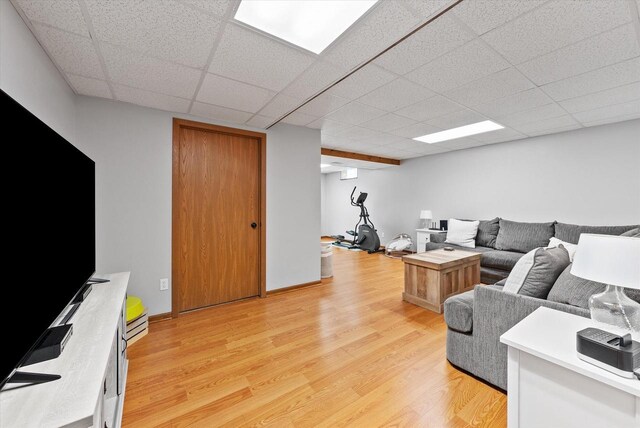 1529 Vogt Dr, West Bend, WI 53095 - living area featuring light wood finished floors and a drop ceiling