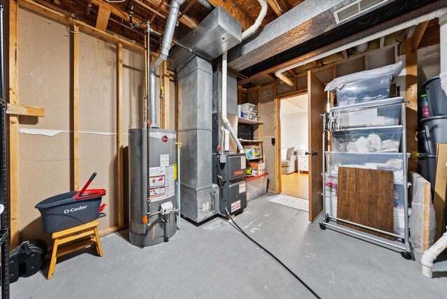 1529 Vogt Dr, West Bend, WI 53095 - unfinished below grade area featuring gas water heater