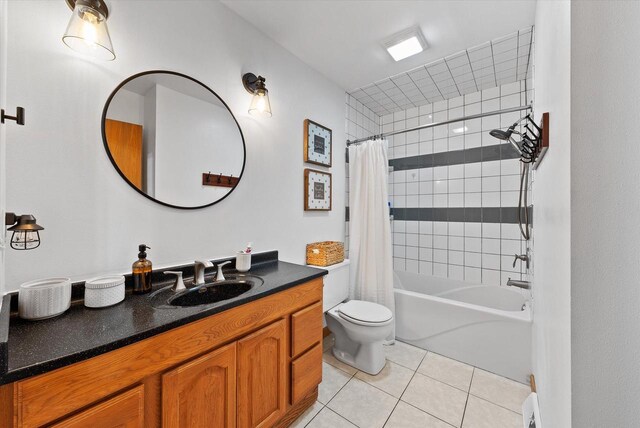 1529 Vogt Dr, West Bend, WI 53095 - bathroom with toilet, vanity, tile patterned flooring, and shower / bath combination with curtain