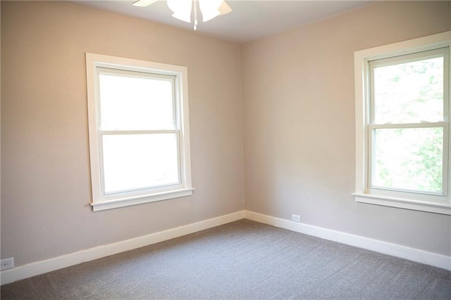 121 Pear St, Chippewa Falls, WI 54729 - spare room featuring healthy amount of natural light, carpet floors, and ceiling fan