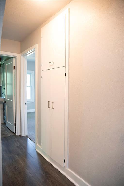121 Pear St, Chippewa Falls, WI 54729 - hall with dark wood finished floors
