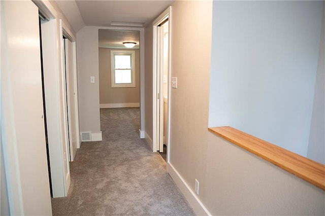 121 Pear St, Chippewa Falls, WI 54729 - hallway featuring carpet floors and baseboards