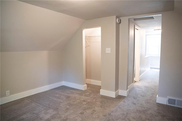 121 Pear St, Chippewa Falls, WI 54729 - additional living space with carpet flooring, baseboards, and lofted ceiling