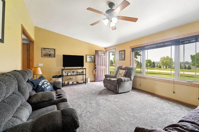 249 Donovan Cir, Rosendale, WI 54974 - carpeted living room featuring ceiling fan, vaulted ceiling, and baseboards