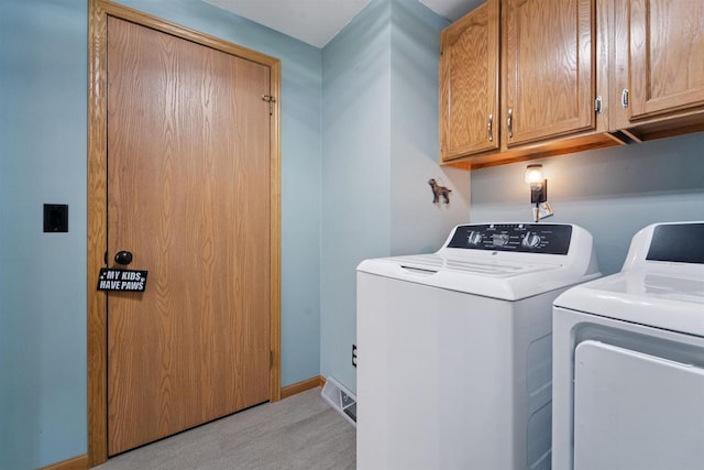 249 Donovan Cir, Rosendale, WI 54974 - laundry area with washer and dryer, cabinet space, light colored carpet, and baseboards