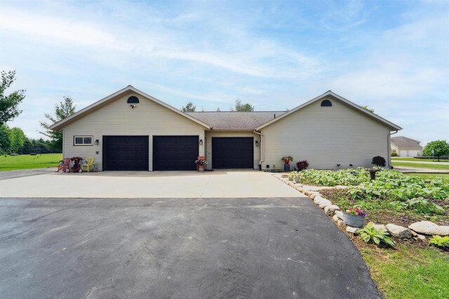 249 Donovan Cir, Rosendale, WI 54974 - single story home with driveway and a garage