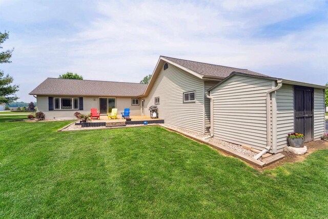 249 Donovan Cir, Rosendale, WI 54974 - back of house featuring a lawn and a wooden deck