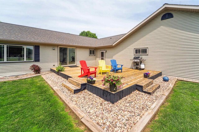 249 Donovan Cir, Rosendale, WI 54974 - wooden deck with a lawn and a grill