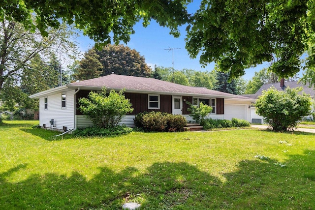 1636 S Driscoll St, Appleton, WI 54914 - ranch-style house with an attached garage, a front yard, and board and batten siding