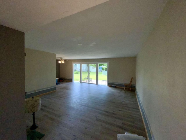 874 E Petunia Ln, Beloit, WI 53511 - unfurnished living room featuring wood finished floors and ceiling fan