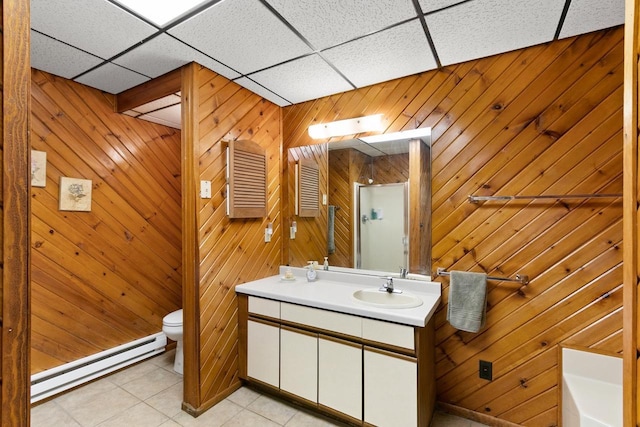 1251 Canyon Rd Unit 40, Wisconsin Dells, WI 53965 - bathroom featuring a baseboard radiator, toilet, vanity, a shower with shower door, and tile patterned floors