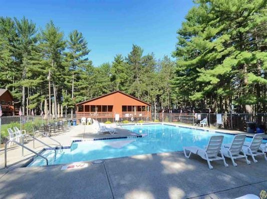 1251 Canyon Rd Unit 40, Wisconsin Dells, WI 53965 - community pool with a patio