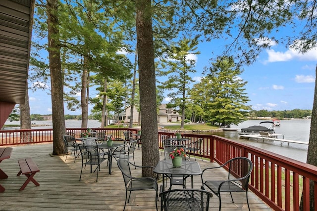 1251 Canyon Rd Unit 40, Wisconsin Dells, WI 53965 - wooden deck with outdoor dining space and a water view