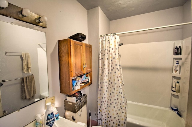 1033 S 11th St, Manitowoc, WI 54220 - bathroom featuring shower / bathtub combination with curtain, toilet, and vanity